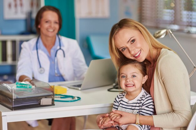 Mother and her daughter paying a visit at the doctor