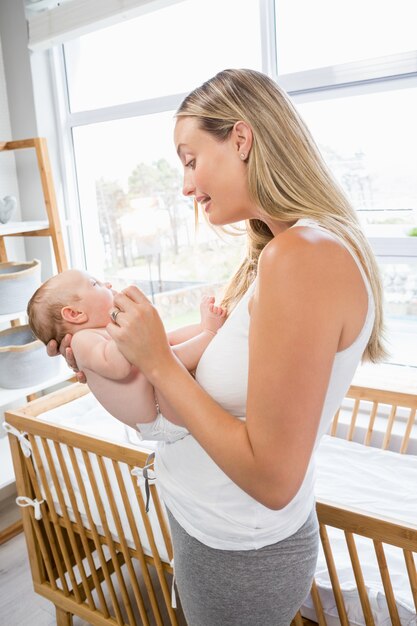 Mother holding her baby boy