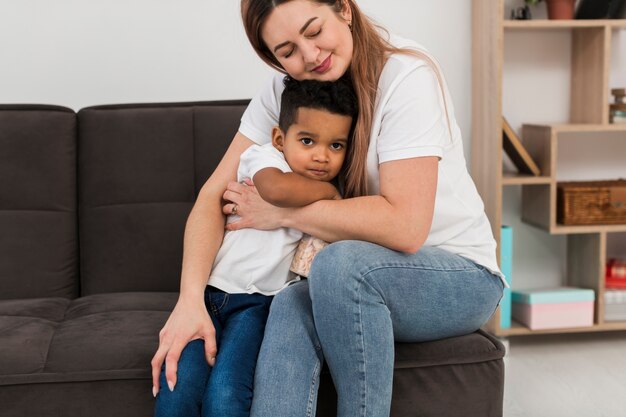 Mother hugging her son