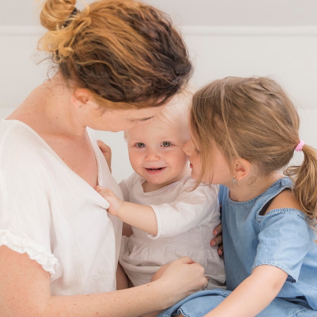 Mother playing with children