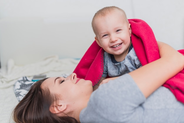 Mother playing with her son