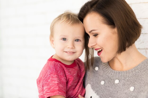 Mother smiling at baby