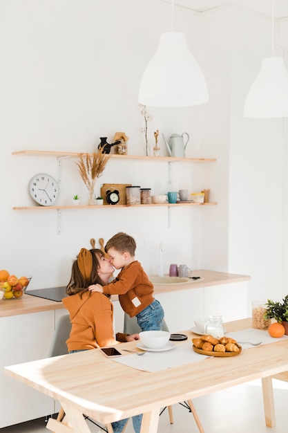 Free photo mother and son kissing