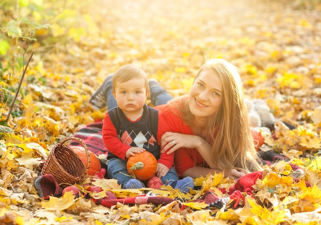 Mother and son looking at camera