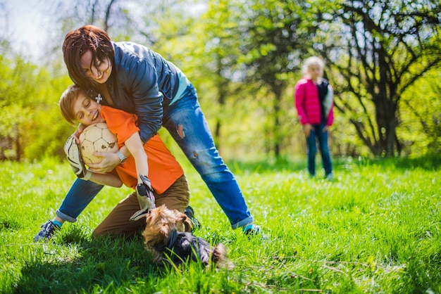 Mother and son playing with ball