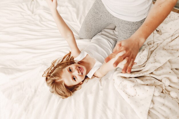 mother with cute blond daughter