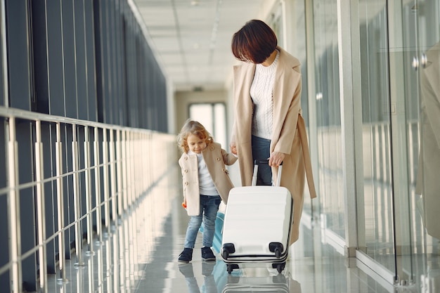 Mother with daughter at the airport