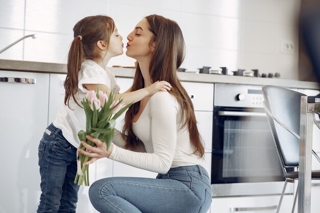 Mother with daughter at home