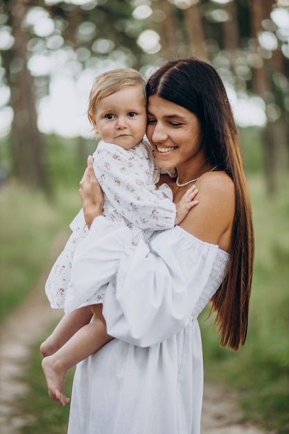 Mother with her baby girl in park