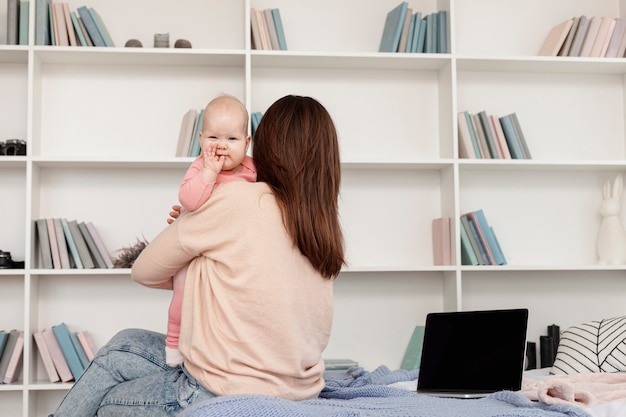 Mother with her child at home