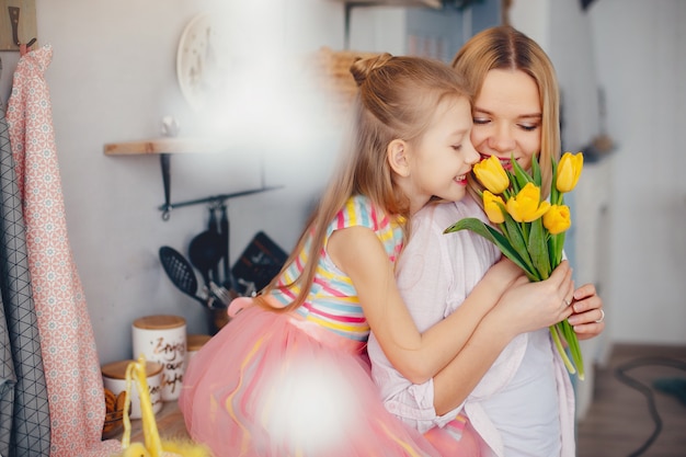 Mother with little child at home