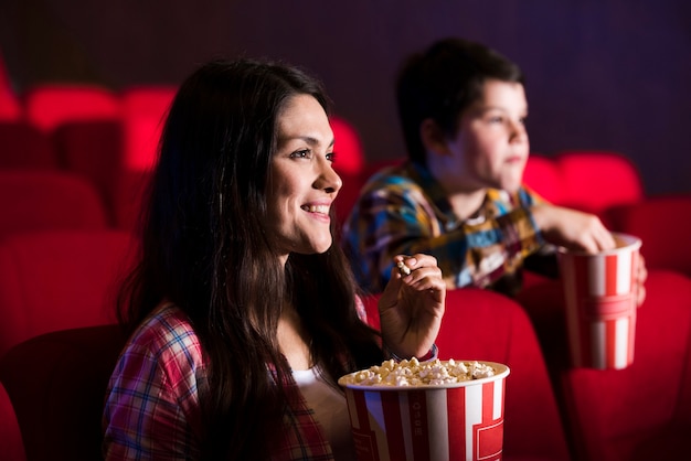 Mother with son in cinema