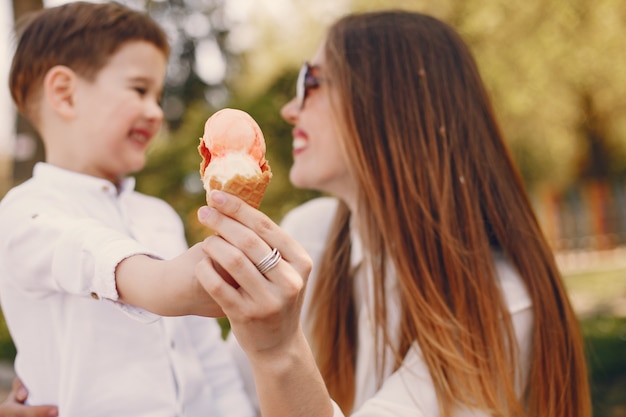 Mother with son playing in a summer park