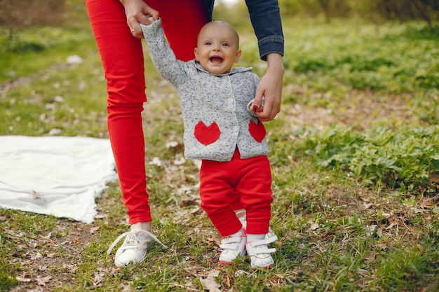 Mother with son in a spring park