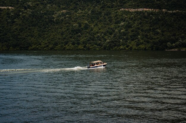 Motor boat moving on the beautiful lake