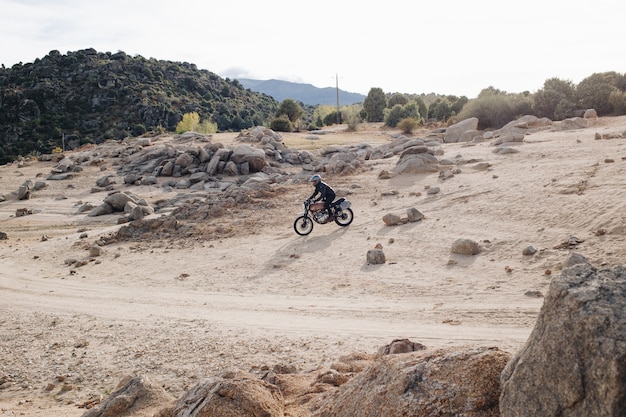 Free photo motorcycle rider on offroad gravel track