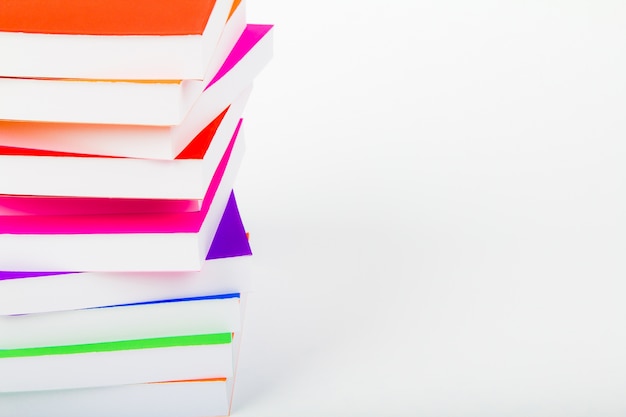 Mountain of books with white background