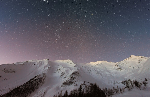 Free Photo mountain covered snow under star