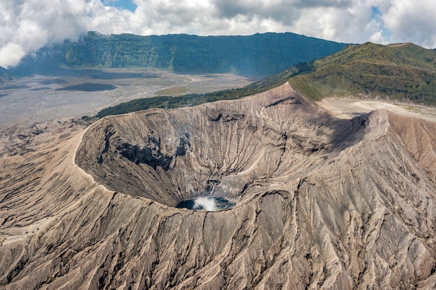 Free photo mountainous landscape with a volcano crater