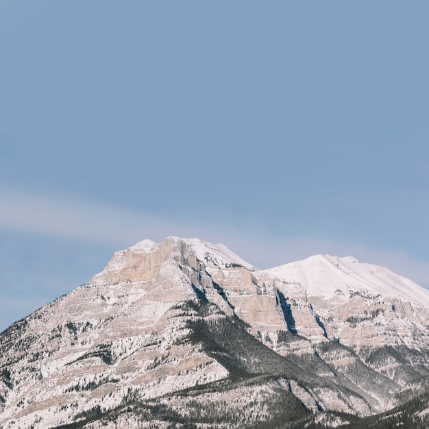 Mountains on blue sky background