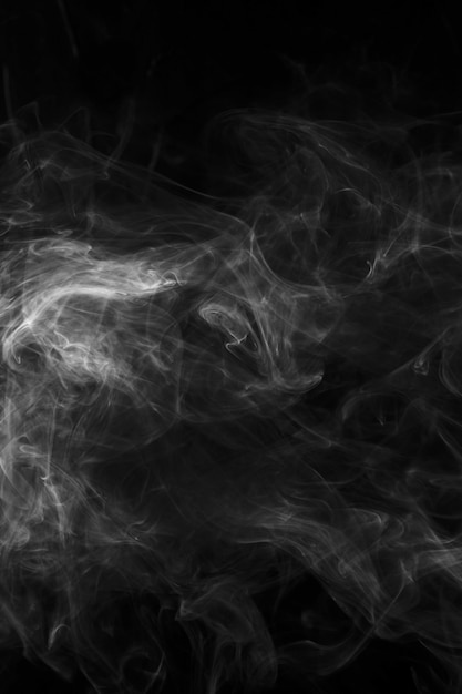 Free photo movement of white smoke textured on black background for art design