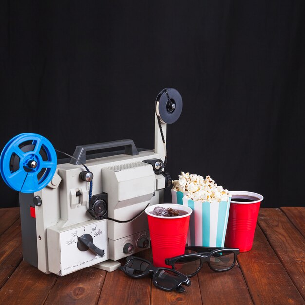 Movie projector, 3D glasses and cinema food