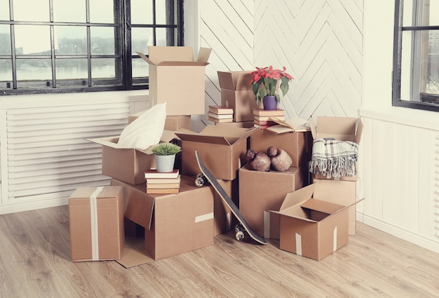 Free Photo moving home with cardboard boxes