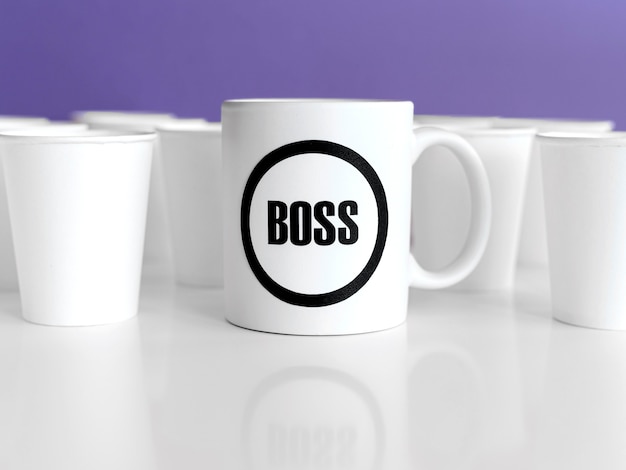 Free photo mug with boss text on table