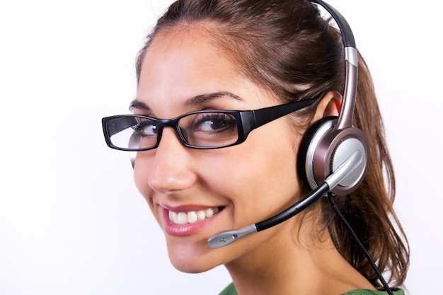 Free Photo mujer con auriculares en un centro de llamadas