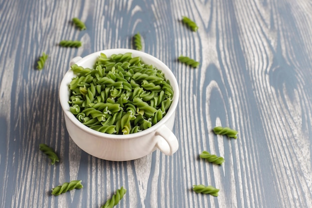 Free photo multi-colored gluten free vegetable fusilli pasta.