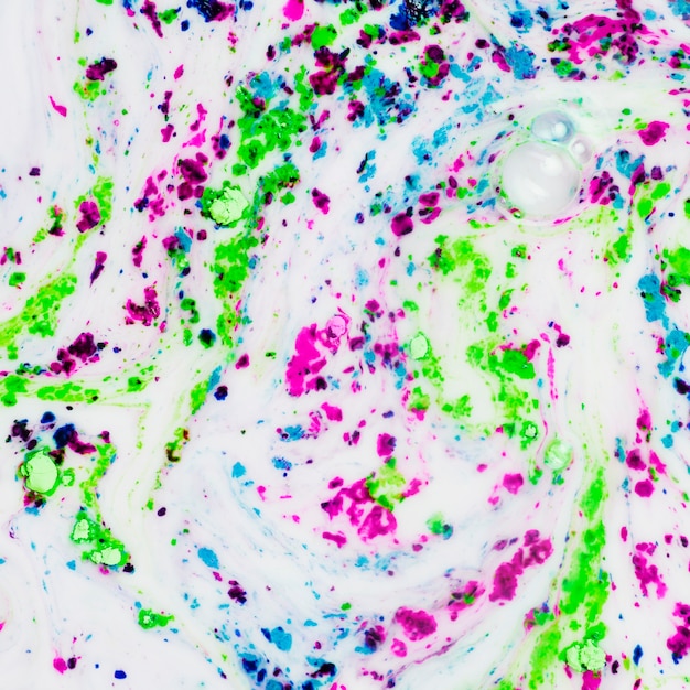 Free Photo multicolor painted water with bubbles