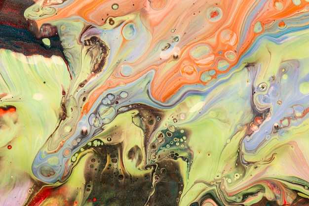 Free photo multicolour colourful background in acrylic pouring