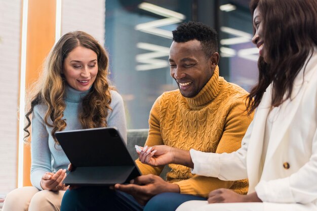 Multiracial group of people discussing business in an office