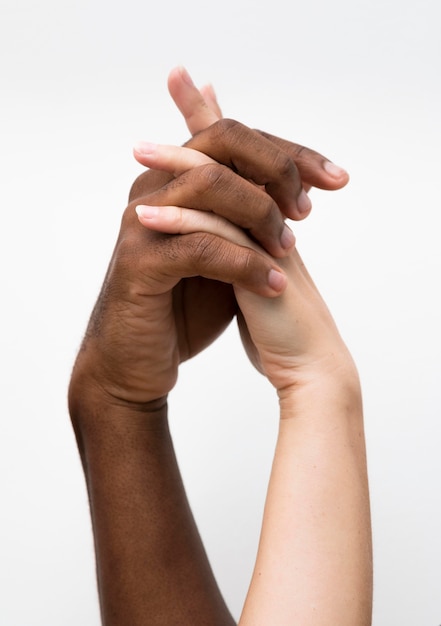 Free photo multiracial hands coming together