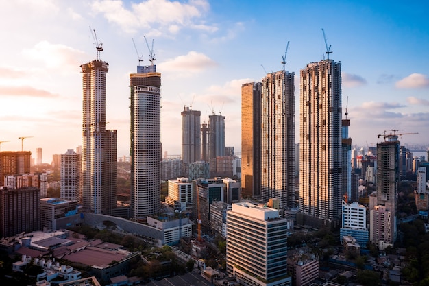 Free photo mumbai skyline skyscrapers under construction