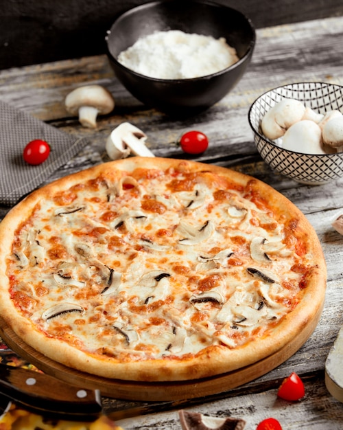 Free Photo mushroom pizza on the table