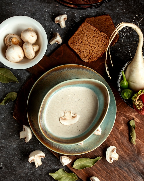 Mushroom soup with side vegetables