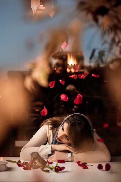 Free Photo muslim female model in romantic decorated cafe