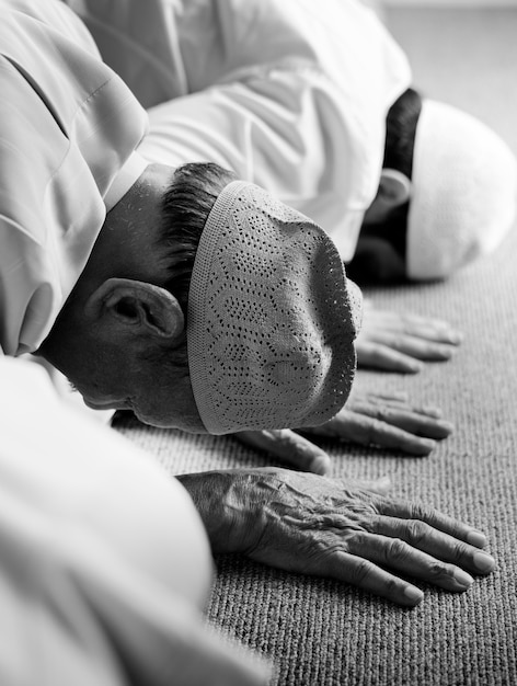 Free photo muslim people praying in sujud posture