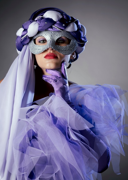 Mysterious woman with carnival mask