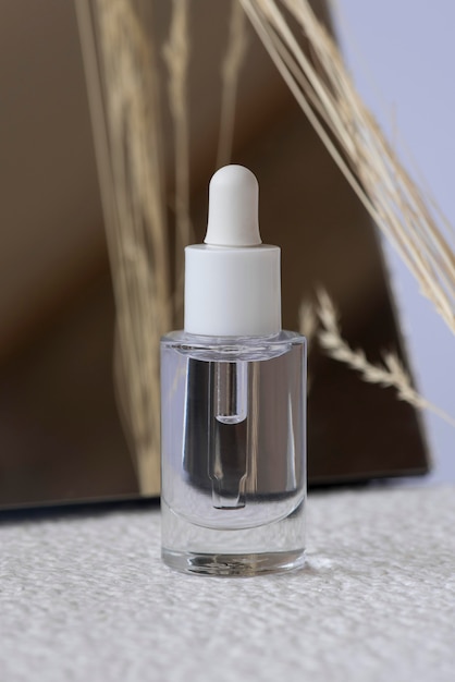 Free Photo nail serum with plant