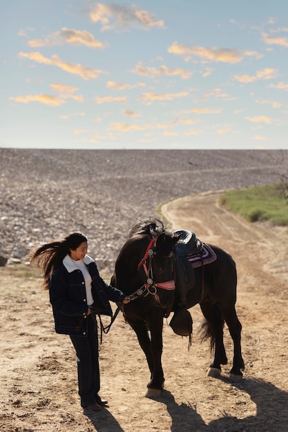 Free Photo native american man with his horse