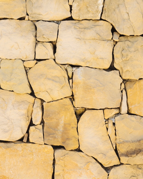 Free photo natural brown rock wall