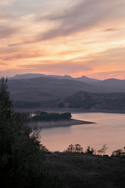 Free photo natural landscape with sunrise and river