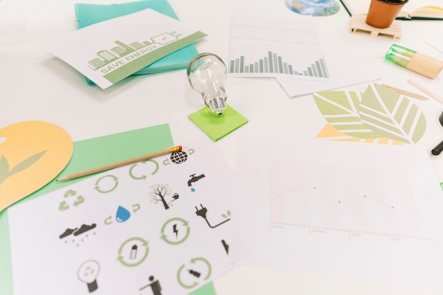 Free photo natural resources with icon and graph on desk