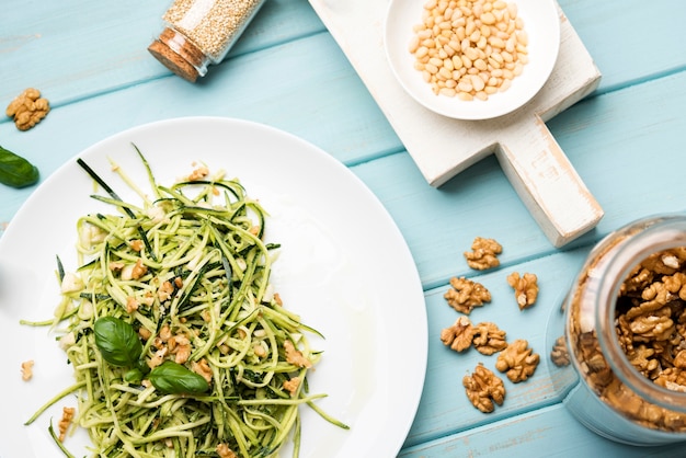 Natural salad on plate with nuts and seeds