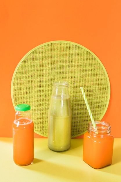 Natural smoothie in bottle and jar