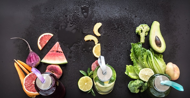 Free Photo natural smoothie drink on a black wall. flat lay. top view.