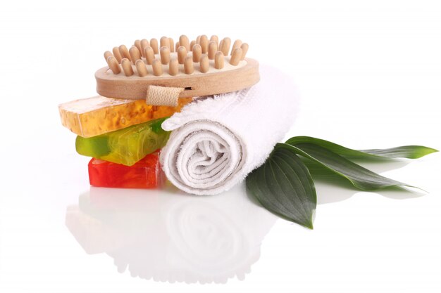 Natural soap with white towel and brush