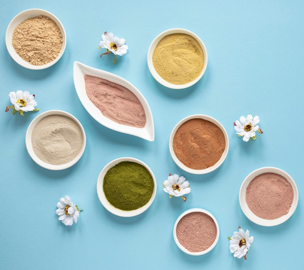 Natural spa sand in bowls and flowers